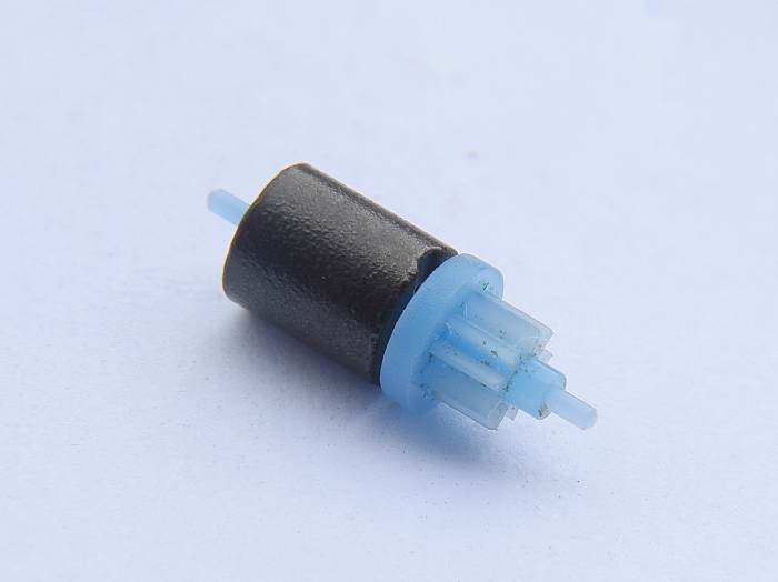 This tiny rotor magnet is about 3/8" or 10mm long. Clean the two ends of shaft pins to reduce friction.