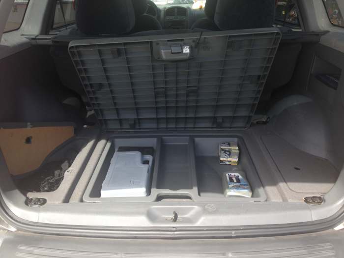 Check for storage solutions. Tool kit, motor oil, and other items stow neatly in built-in spaces.