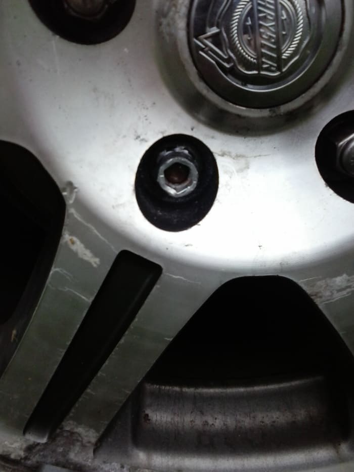 How to Remove a Stuck or Stripped Lug Nut AxleAddict