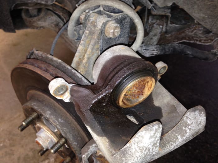 This brake caliper started leaking because of contaminated brake fluid, the fluid deteriorated the rubber seals over time.