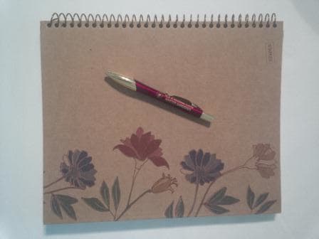 A spiral notebook is a great alternative to the expensive gardening journals available from garden supply companies.