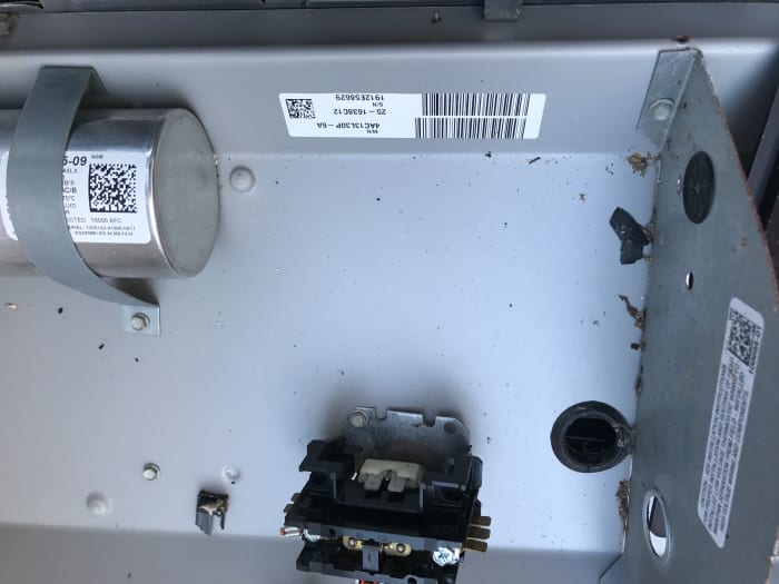Here is one example of what a sticker inside the A/C service panel may look like and be located. (top center)