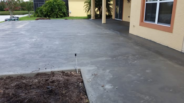 This will get a special finish that keeps the surface cool, but first, it has to cure. Luckily, we had 2 days of sun to help the concrete dry and set.
