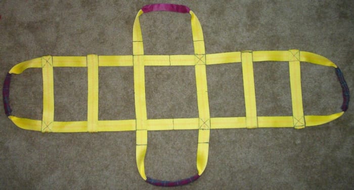This hand-sewn sling with padded handles made carrying the aquarium easy for four small people.