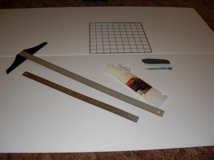 The coroplast is the sheet of white on the bottom. The cube square is shown in the upper right on top of the picture. Notice that my cubes have 9 squares across.