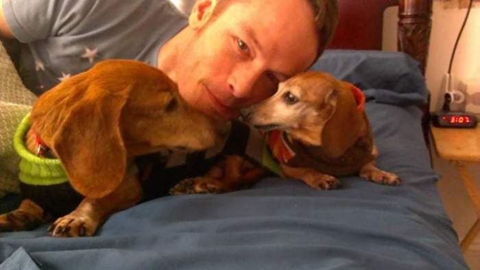 Me with Hallie and Perrin. Hallie (RIP) and Perrin, two dogs who benefited tremendously from rescue organizations.
