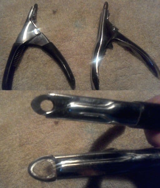 The classic nail cutter: the guillotine. Note the different sizes for the cutting area. The hole has to be big enough for the nail to fit inside.