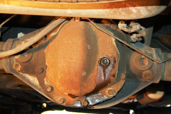 After the differential is full, remove the transfer pump. Reinsert the fill plug and tighten, again, do not overtighten. Wipe away any excess fluid that dripped out with a paper towel or shop rag.