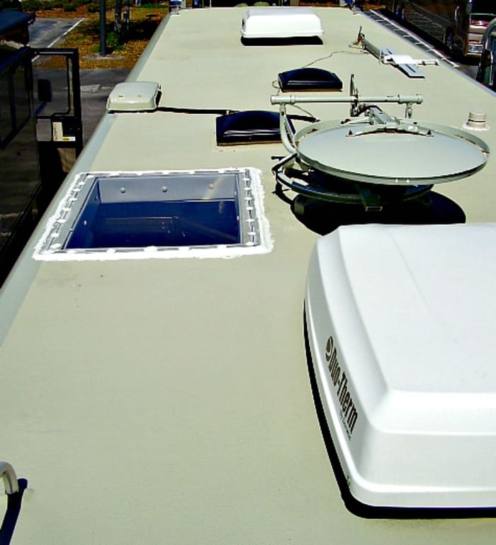 This fiberglass roof is one piece that wraps over the front and rear areas of the RV to help eliminate leaks.