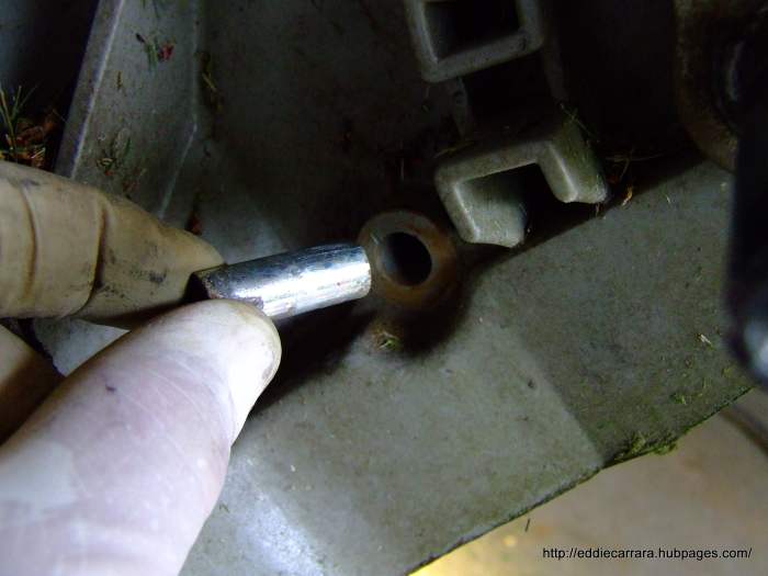 Also remove the collar under the bolt that holds the deck cover, on the Honda Harmony 215