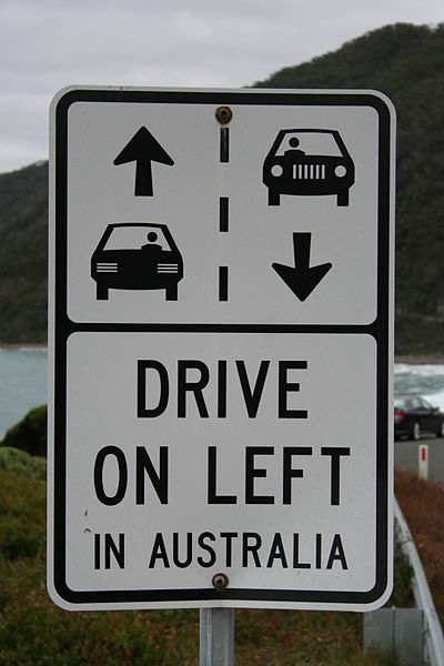 Australian road sign reminding foreign visitors of which side of the road to drive on.