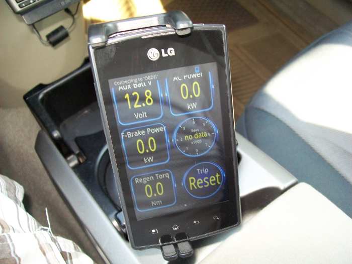 My Android phone held in a cup holder mount, using one of my dashes on Torque to display various indicators. Only the voltage for the 12-Volt battery is showing as the Prius isn't in READY mode.