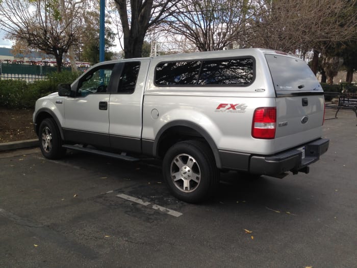 SnugTop Rebel, and yes, this truck may look strange because it's a very rare combination: an extra-short bed on the supercab chassis, which was mostly only used on the Raptor .trucks