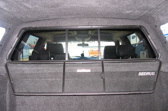 As you can see, with the front slider dropped down and out of the way, cleaning the cab window is a lot easier.