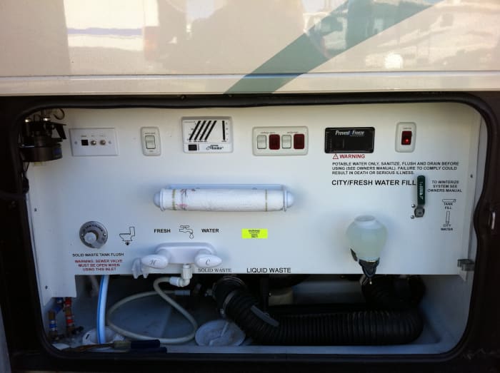 This is a Typical RV Service Center which provides access to all of your Holding Tanks, and more.