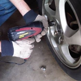 Stuck lug nuts are easy work for this Wagan impact wrench that plugs into a 12-volt car power outlet.
