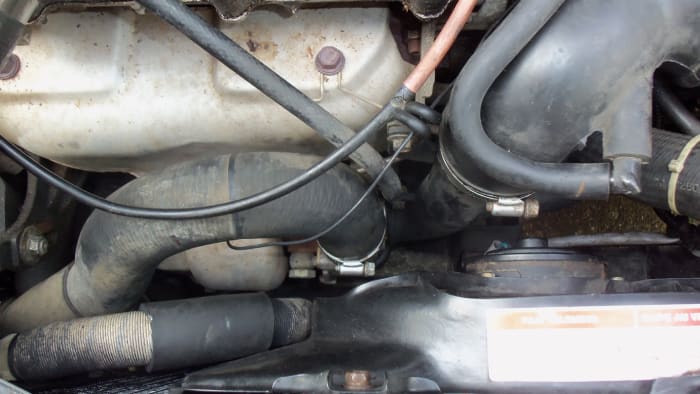 The turbo in a 91-94 Mercury Capri XR2 is low and behind the radiator, it is not located in the throttle area where it says, Turbo.
