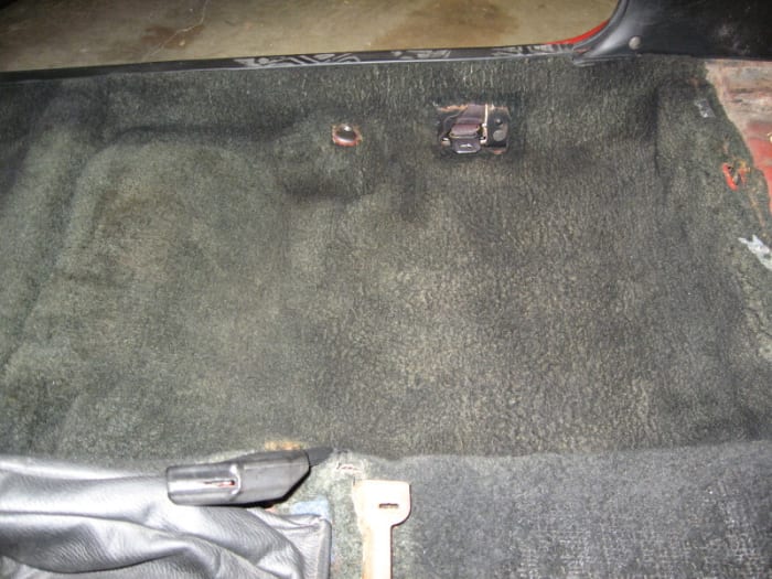 After shot of the right rear foot-well and part of the hump; greatly improved, even though the hump is still quite bald.