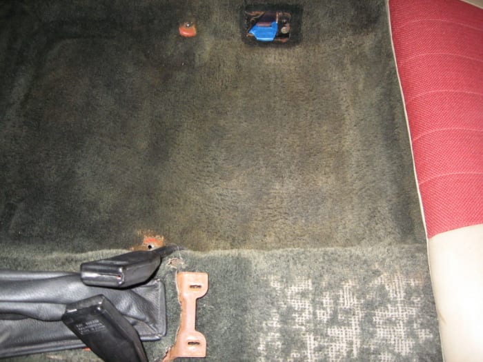 Before shot showing the right rear foot-well and the rather bald carpet on the drive-shaft hump. By the way, this would have been a prime candidate for total carpet replacement.