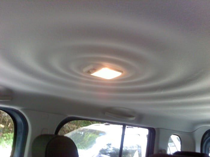 I would assume that the "ripples in water" pattern on the interior ceiling is supposed to exude a feeling of inner calm ... or something.