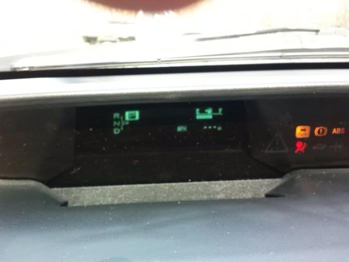 Picture of the dash showing the blinking hyphens in place of the typical ODO reading.
