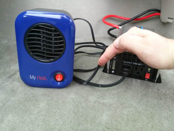 Heater and inverter both turned on and allowed to stabilize for 1 minute. It's hard to see in this photo, but the inverter has a "power level" indicator, which has the bottom-most LED lit up with the heater on. Each LED appears to equal 120 watts.