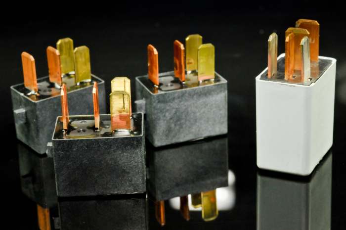 The typical four-prong relay has two circuits: one light-duty control circuit and one heavy duty "load" or "work" circuit.