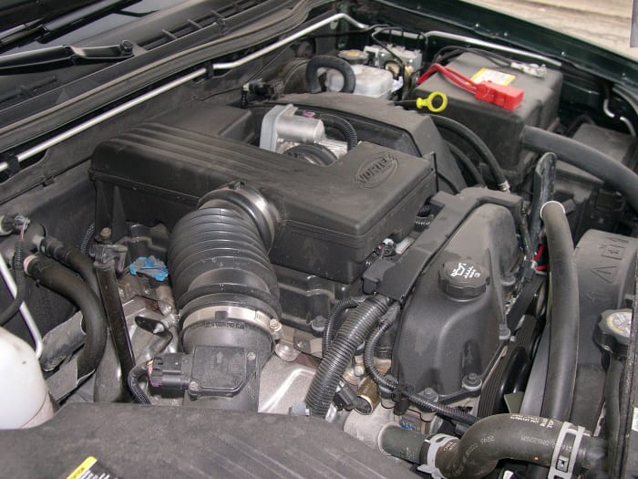 Check the air filter housing and hose between the MAF sensor and throttle body when searching for vacuum leaks.