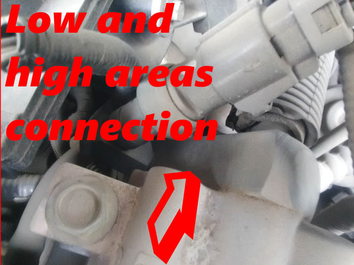 High and low pressure areas equalize after AC system is turned off, producing a hissing noise.