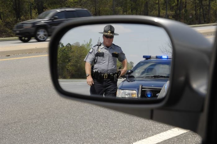 How often have you seen an aggressive driver and said “There’s never a cop around when you need one?” Well, here comes one.