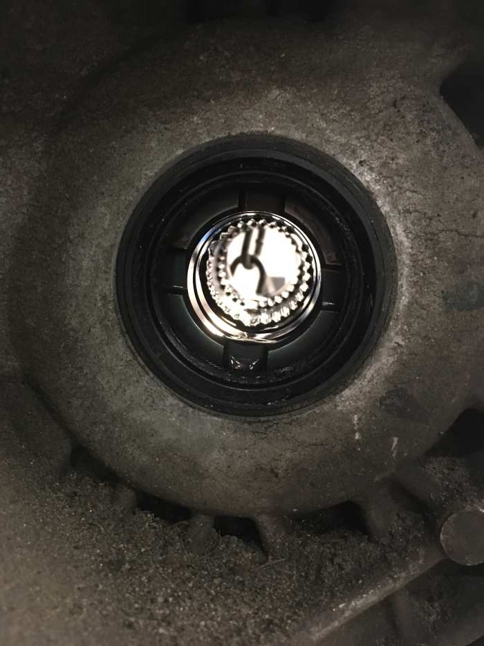 The little teeth in the center of the picture are the splines inside the transmission differential that mesh with the splines on the CV joint.