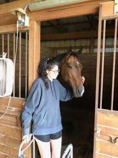 This picture was taken on July 13 (exactly three months after my accident) was the first time I made it back out in my barn. This is my main man, Kemerton and I. He is old and crippled now. It seems like now we relate more than ever!