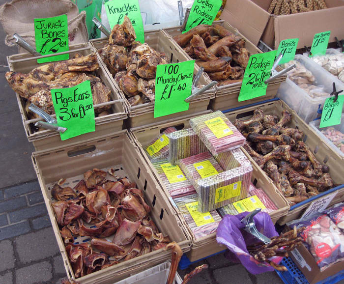 Many dog treats such as bones, antlers, rawhide and pigs' ears, are available from pet stores and markets but they may not be the healthiest options for your pet