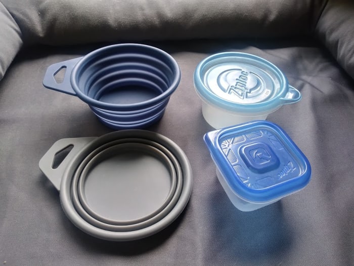I take a small plastic container filled with cold water when I walk my pup. Some people prefer collapsable bowls and they carry a water bottle separately.