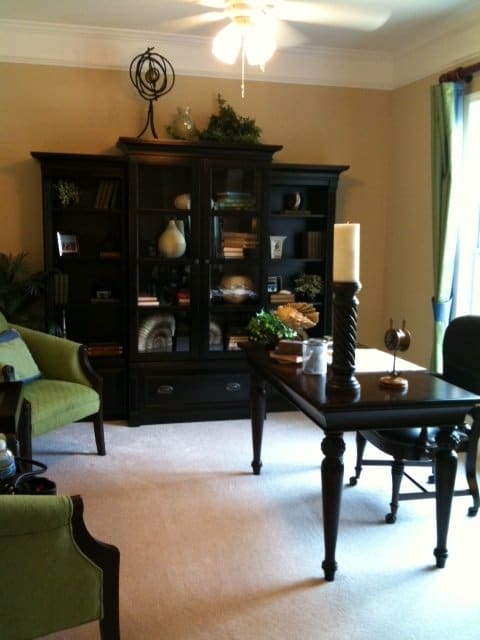 To help you succeed at working from home, re-purpose existing space to function as a home office. This was a living room, now it's an office.