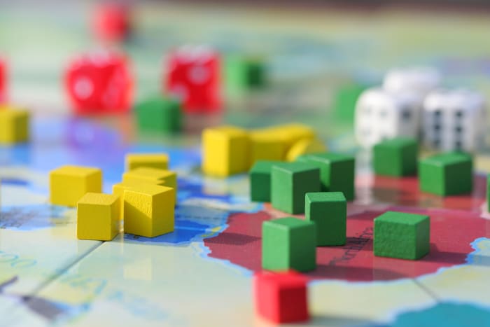 Just like the famous board game, investment risk is unpredictable, but you can pick a good strategy.