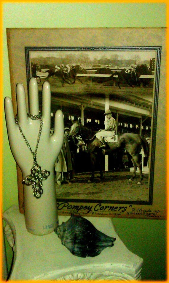 Vintage porcelain, vintage photographs or pictures, vintage jewelry, vintage seashell. All these things in this photo could be sold on Etsy. Etsy considers vintage something only 20 years old.