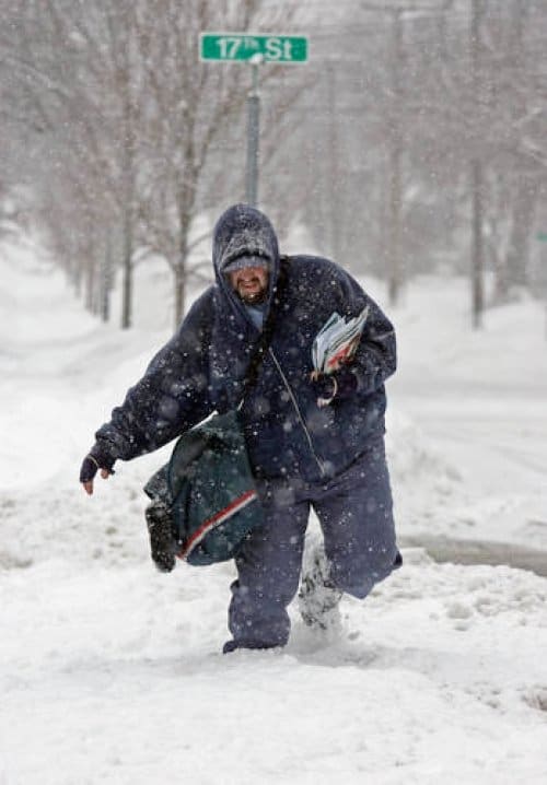So you think you're ready to brave the elements? Good luck trying to talk your boss out of it. Here Mailman Bill Margo trudges though deep snow in Cuyahoga Falls, Ohio.
