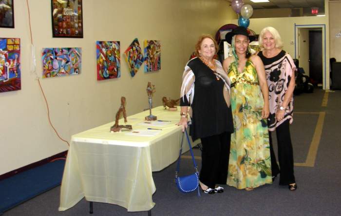 The Author with some of her patrons, Susan, who also donated food for the event, and her sister.