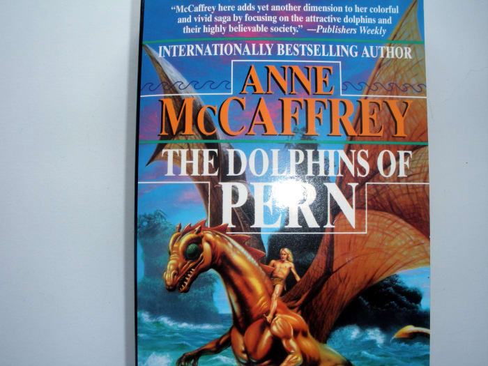 Not only bad flash bounce, but not cropped tightly to show just the book cover--and the bottom of the book is cut off.