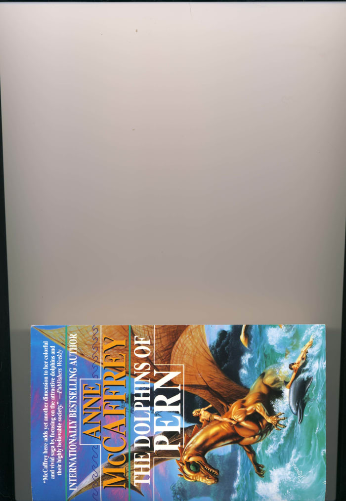 Even with the drape over the scanner, you can easily see that the lid is not fully closed. Remember to crop before you import!