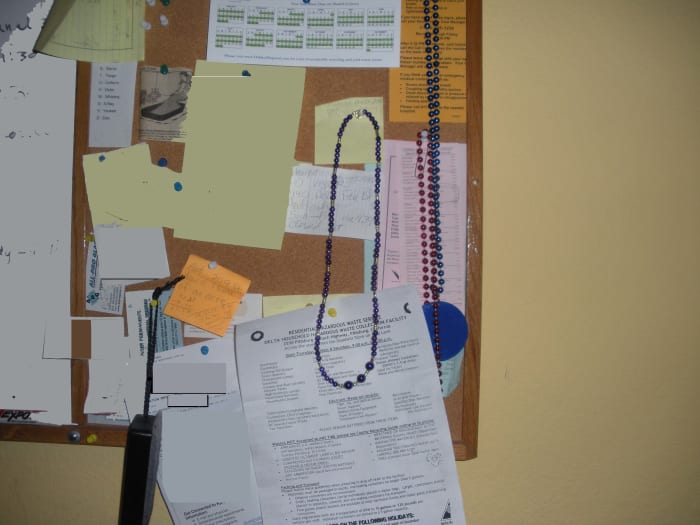 Item is too far away from camera; background is very cluttered; there are similar items to the right. (The only Photoshop work here was to obscure items with personal information.)
