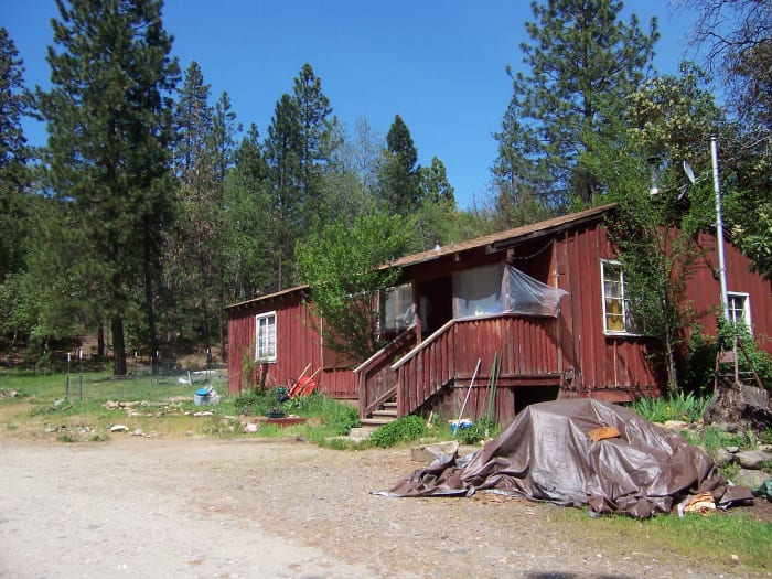 This is the house I moved out of—the little red cabin in the mountains. I loved living there, but I desperately needed a change.