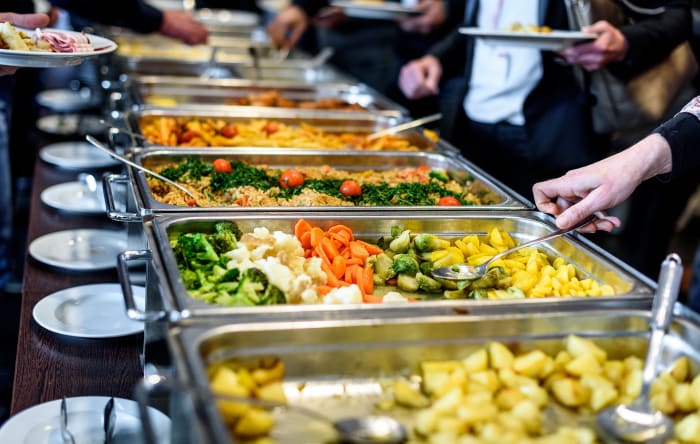 Piling too much food on your plate at the buffet and drinking too much alcohol can affect your energy and engagement levels. Feeling too full and a bit tipsy to boot is a bad combination when you're anxious about being sociable.