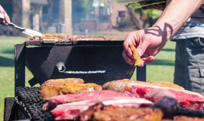 Standing in as the barbecue chef will let you meet a lot of people as they go through the food line, but the good news is that you won't have to talk to any one person for too long.