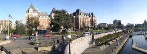 Victoria Waterfront at Empress Hotel. One summer I saw free tango lessons given on the Waterfront at a cafe. The Greek restaurant was also very good. The insect museum was fun and along the walkways we saw hand-carved doors. [Photo by avhell on flckr