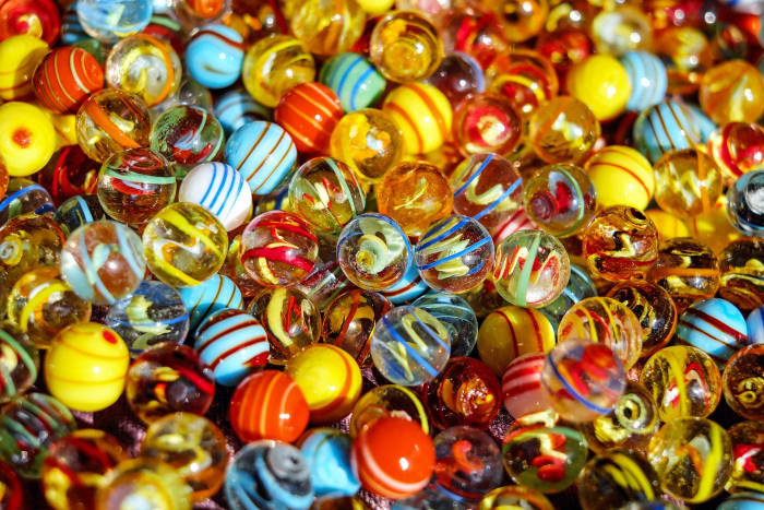 Using marbles for repurposing: Marbles make great fillers for small holes in fences or gates.