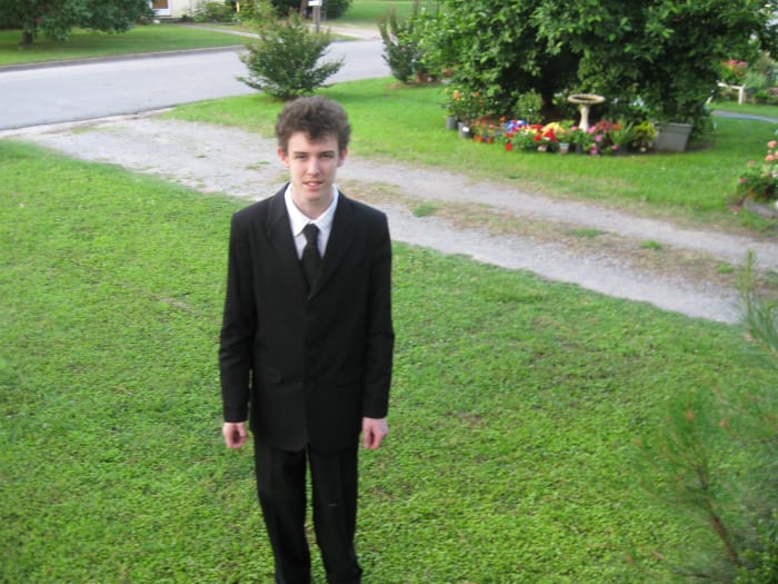 While a suit is not necessary for the initial application process, it is important to dress up.