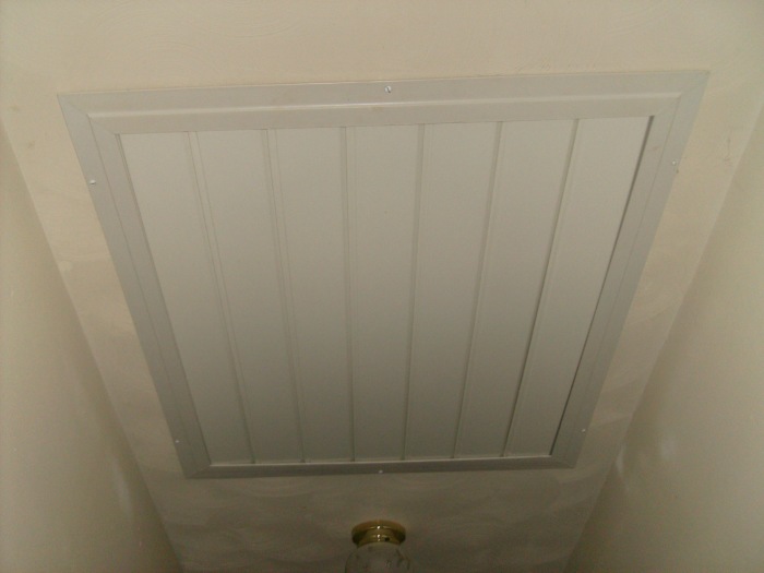 This is the attic fan that my stepdad installed in my hallway. The fan is installed up above the open slats (in the attic) which open when the fan is switched on. (Remember to open the windows before switching on!)