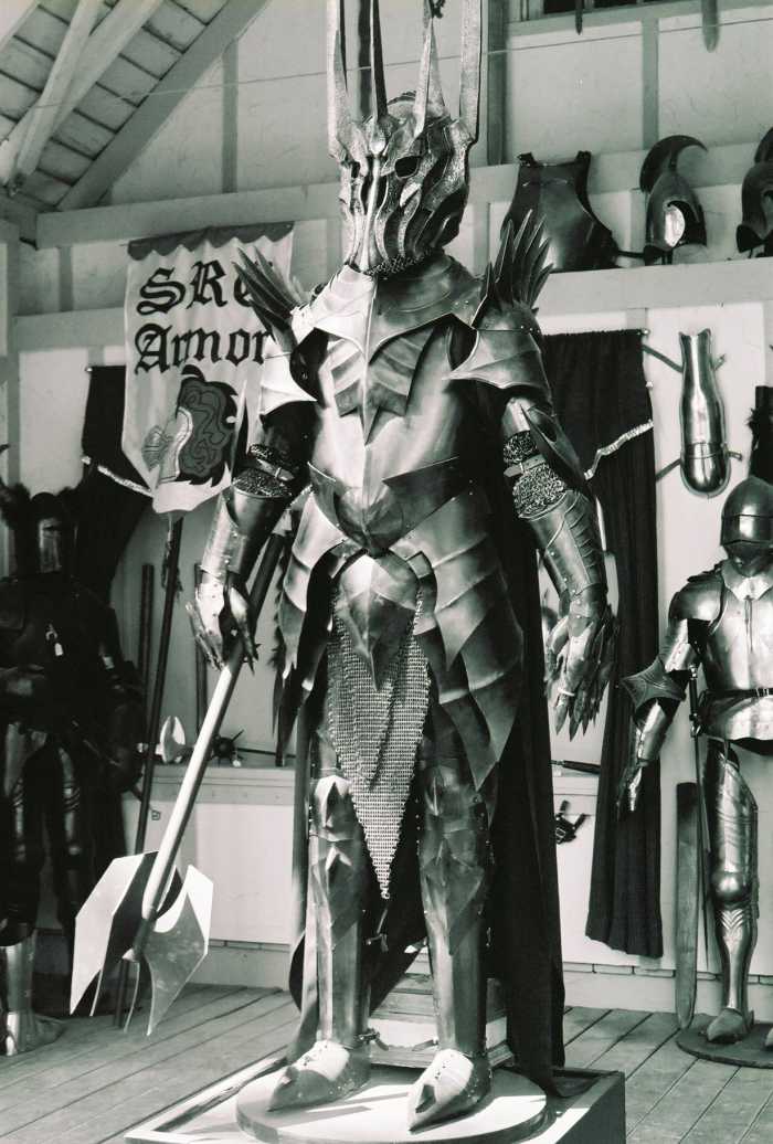 Replica armor of the Dark Lord of the Rings Sauron. The costume is the result of the positive synergy of a great team The figure shows the ultimate negative synergy - people and monsters working together for destruction, and undercutting one another.